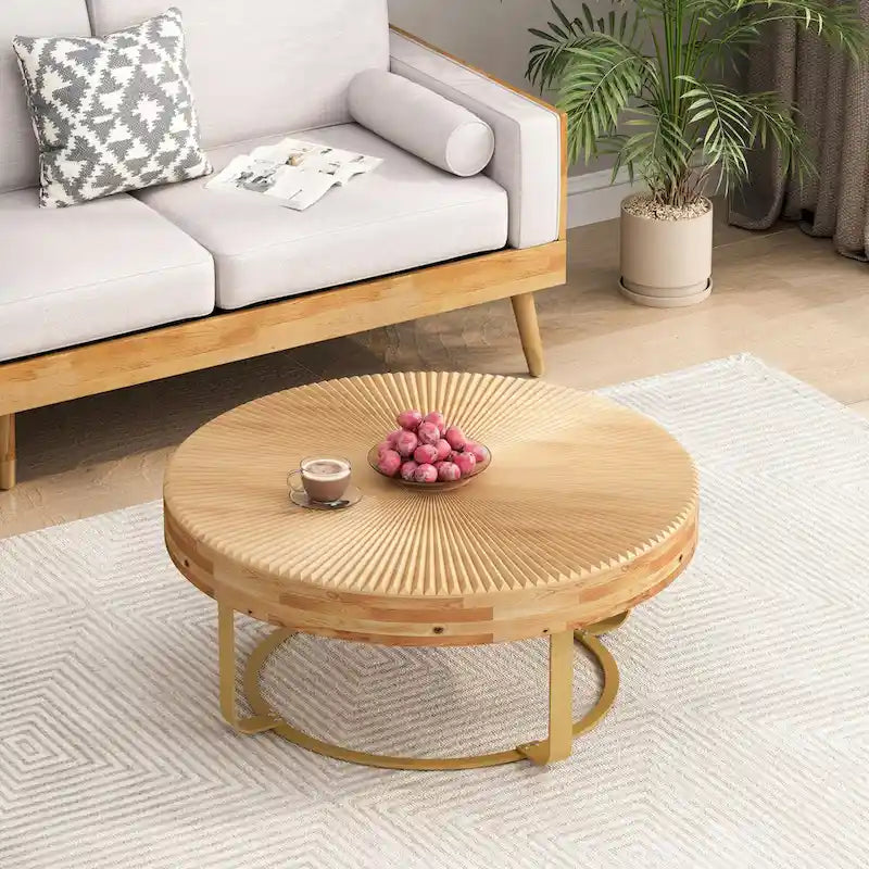 Table basse ronde moderne avec motif en bois sculpté et pieds en métal