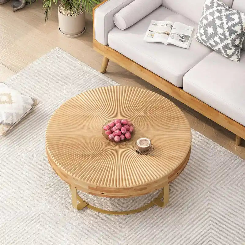 Table basse ronde moderne avec motif en bois sculpté et pieds en métal