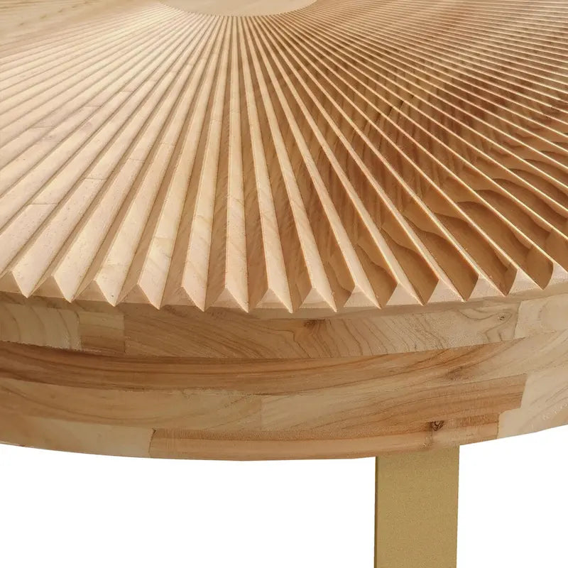 Table basse ronde moderne avec motif en bois sculpté et pieds en métal
